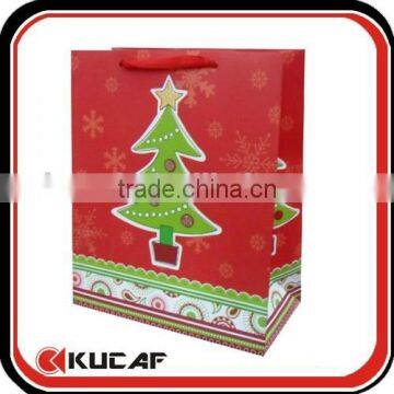 Decorated paper xmas gift bag