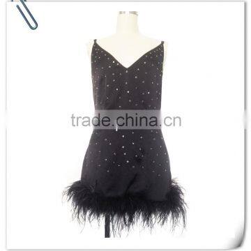 Lady's silk satin black ironed beads evening dress with ostrich hair .