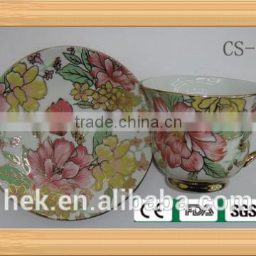 flower tea cup and saucer with gold rim