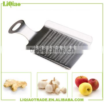 Stainless steel garlic press with handle also for ginger