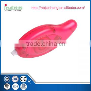 plastic red colored correction tape