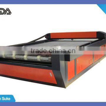 Laser cutting lathe for roller textile