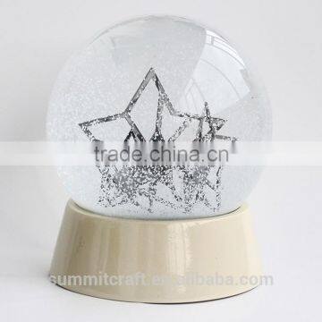 Fashion modern resin star snow globe