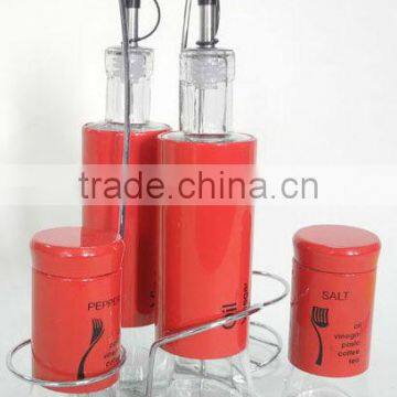 red spraying plastic cylinder glass oil bottle with dispenser spout