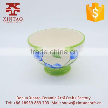 Small white ceramic soup bowl with green rim for hotel use