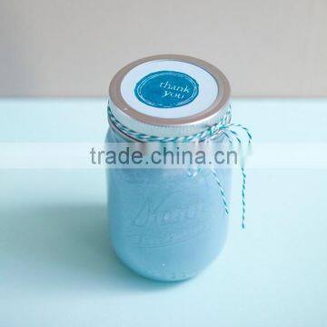 Sprayed colored mason candle with fragrance in white 12OZ sealed jar candle