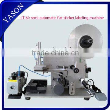 Semi-automatic flat sticker labeling machine