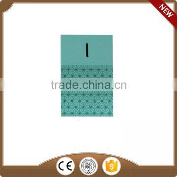 green wooden money-box