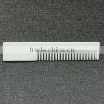 white plastic straight hotel comb
