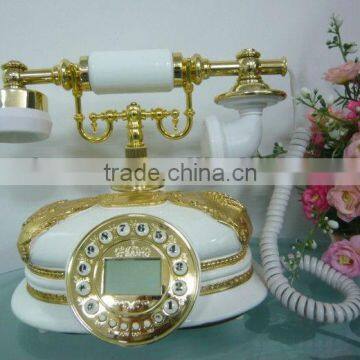 white and golden new caller ID antique resin old telephone