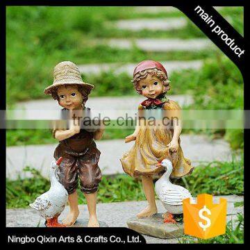 Lovely Promotional Girl and Boy Resin Figurine