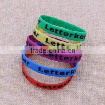 Best selling products colorful silicone o ring bracelet with debossed logo wristband