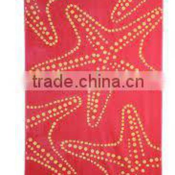 Red starfishes printed beach towel