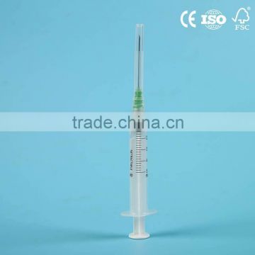 Spring retraction disposable syringe