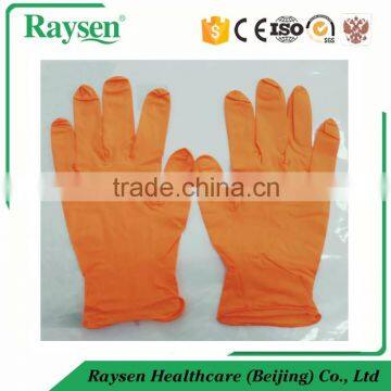 9 inch powder free nitrile examination gloves orange color