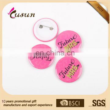 we make cheap custom novelty custom plastic pins round badges