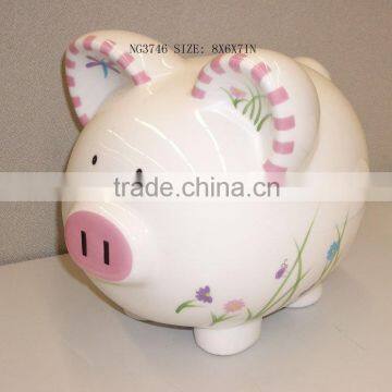 Ceramic piggy bank with Spring design