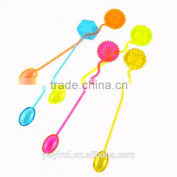 Colorful plastic coffee stirrers with spoon