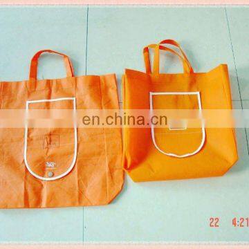 2012 fashion orange 100% non-woven handle environmental protection shopping bags