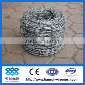 installing barbed wire fence