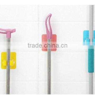 Wholesale Stock Magic Wall Suction Plastic Mop Handle Storage Holder photo-3