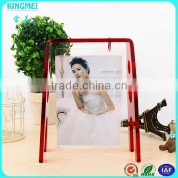 KM-VP94 Creative Design Scrolling Acrylic Swing Shape Photo Moving Picture Frame photo-2