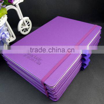 purple faux leather embossed brand new notebook with paper Folder in the back