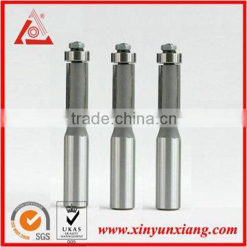 Tungsten carbide cleanning bit with bearing