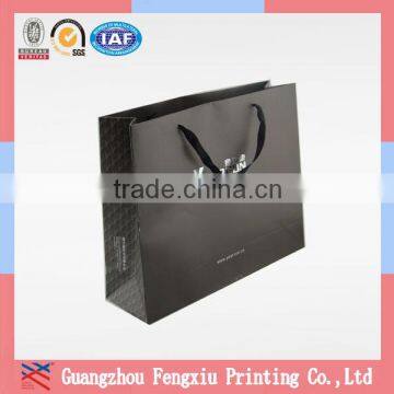 China Manufacturer Luxury Plain Paper Gift Bag Ribbon Handle