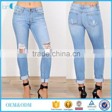 Wholesale ladies white summer machine distressed skinny jeans