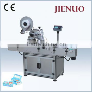 High speed horizontal wet glue labeling machine