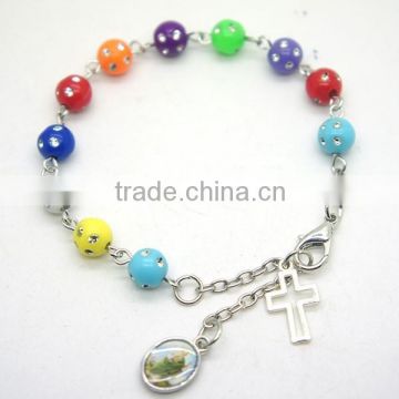 acrylic beads bracelet with small religious medals and across,colorful catholic bracelet