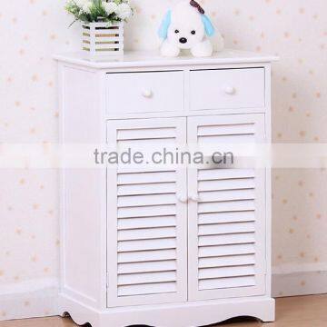 The entrance of the white blinds double door shoe cabinet