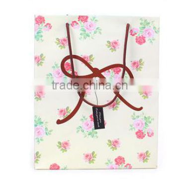 Small flowers fresh style coffee bow gift paper bag vertical version