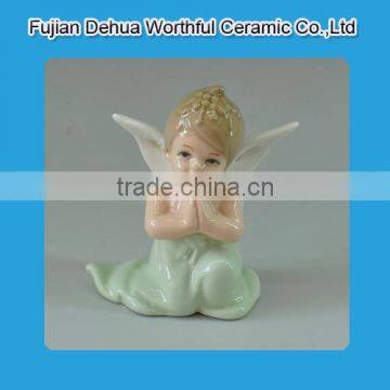 Decorative ceramic praying angel statue for home decoration