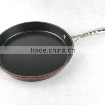 cast iron frying pan with stainless steel handle