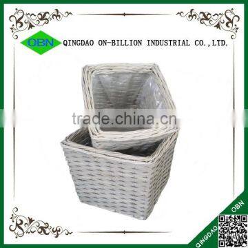 Hand woven wicker flower pot with plastic linning for garden