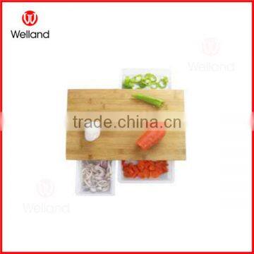 sturdy bamboo cutting board with plastic drawer