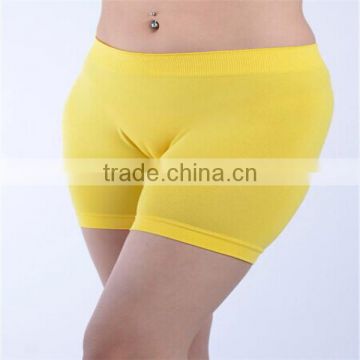 Women plain sports seamless pure color short pants yellow color