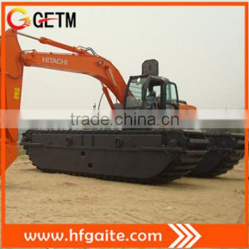 Amphibious excavator with extendable pontoons