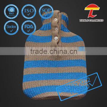 Striped knitted cover for rubber hot water bottle