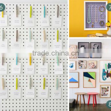 white pegboard for display fixtures