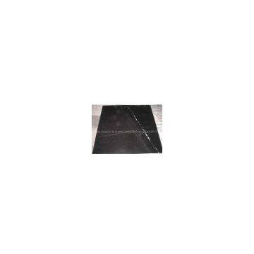 white in black marble