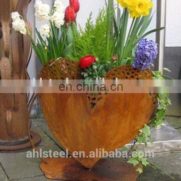 Antique rusty heart shaped corten planter pots for garden