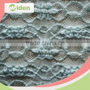 Factory direct supply warp knitted lace floral figures guipure lace fabric