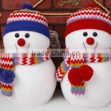 Snowman dress in red hat and scarf