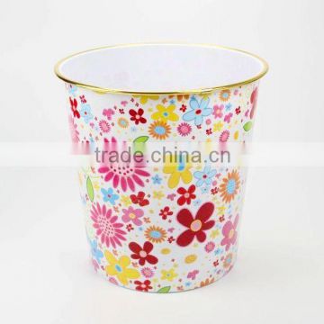 Plastic waste bin with golden edge