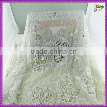 Special sequin tulle embroidery fabric wholesale in guangzhou