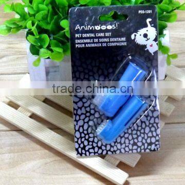 pet gum massager on finger