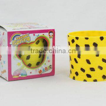 wholesale good quality plastic rainbow spring with smile face/magic rainbow circle